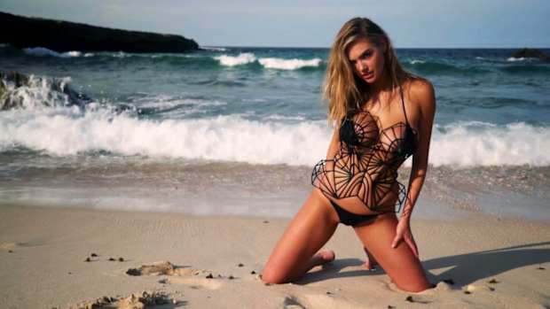 Kate Upton wears a caged corset in Aruba
